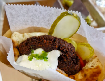 Miznon Chelsea Market signature dishes The Original Whole Roasted Baby Cauliflower
Batata
Falafel Burger